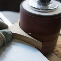 sanding the racket head